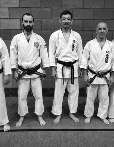 Kioshi Roger Carpenter, Sensei Alberto Scarpellini, Kancho Nobuaki Kanazawa, Sensei Domenico Scarpellini, Sensei Chris Gillies all standing in line